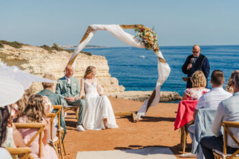 Luxury wedding photography and videography in Algarve & Europe. Elegant, emotional storytelling by Olga & Igor Rosi, Algarve Pictures. Full-day, elopement & destination packages available. Luxury wedding photography and videography in Algarve & Europe. Algarve clifftop wedding venue. Elegant, emotional storytelling by Olga & Igor Rosi, Algarve Pictures. Full-day, elopement & destination packages available. Bride and groom portrait at sunset with dramatic cliffs and ocean in Carvoeiro.