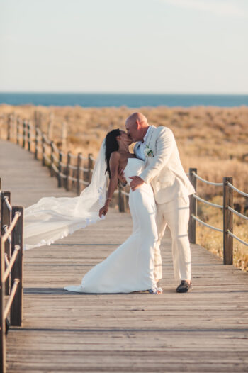 Luxury wedding photography and videography in Algarve & Europe. Vidamar Resort Albufeira wedding venue. Elegant, emotional storytelling by Olga & Igor Rosi, Algarve Pictures. Full-day, elopement & destination packages available. Luxury wedding photography and videography in Algarve & Europe. Vidamar Resort Albufeira wedding venue. Elegant, emotional storytelling by Olga & Igor Rosi, Algarve Pictures. Full-day, elopement & destination packages available. Bride and groom portrait at sunset by the ocean in Albufeira.